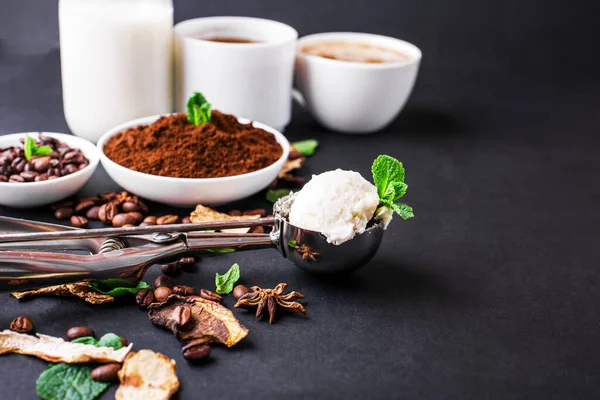 Mushroom Chaga Coffee Superfood Trend-dry and fresh mushrooms and coffee beans on dark background with mint. Coffee break