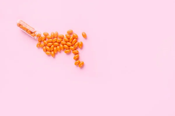 Orange Tabletter Glasflaska Vitaminer Hälsa Sammansättning Rosa Bakgrund — Stockfoto