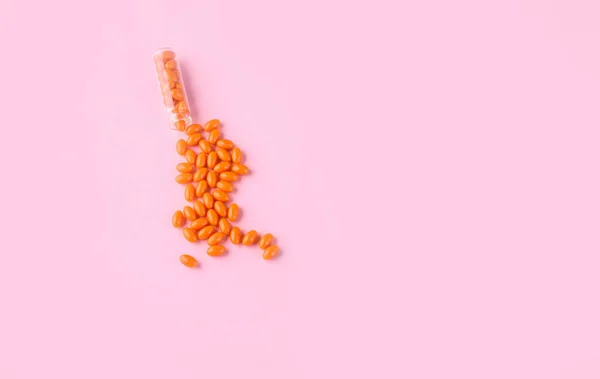 Orange Tabletter Glasflaska Vitaminer Hälsa Sammansättning Rosa Bakgrund — Stockfoto