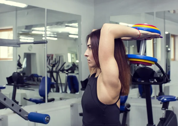 Girl goes in for sports — Stock Photo, Image