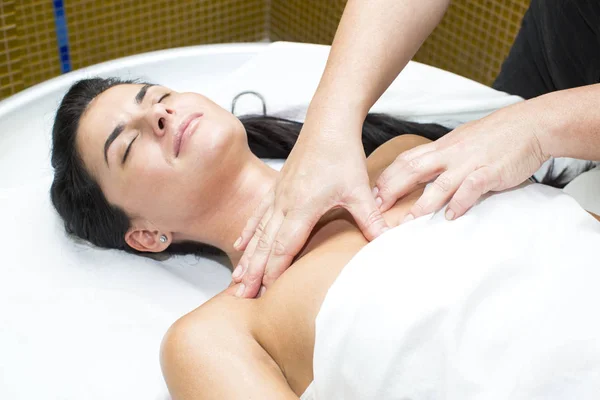 Young girl doing a massage — Stock Photo, Image