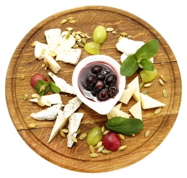 Cheese plate with several varieties of cheese — Stock Photo, Image