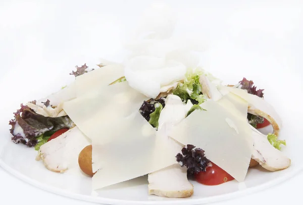 Caesar salad on a white plate — Stock Photo, Image