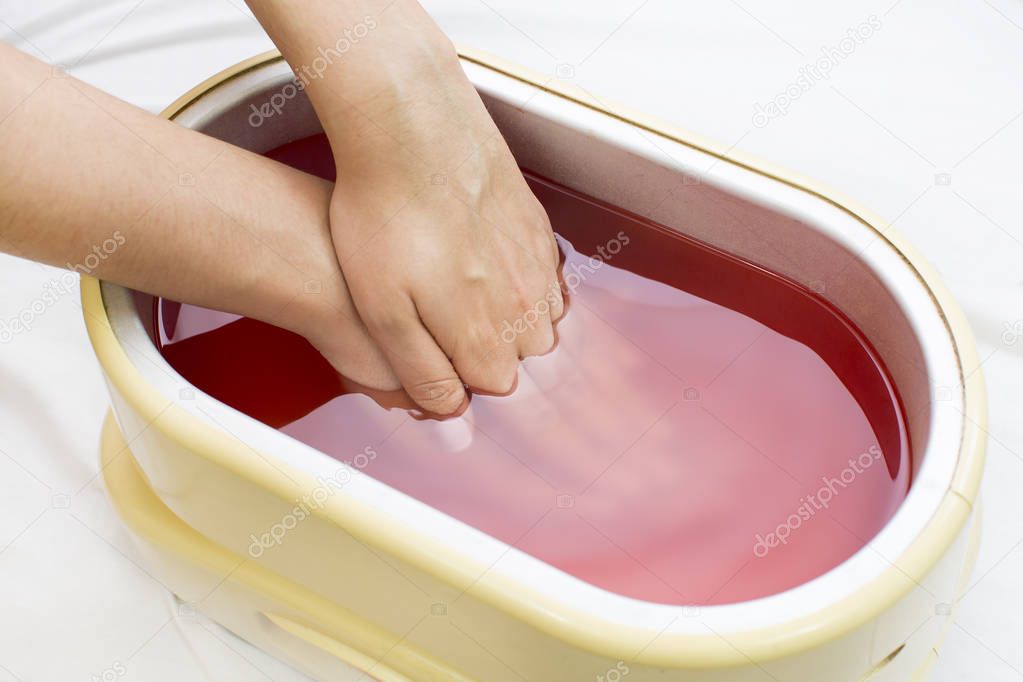 process paraffin treatment of female hands