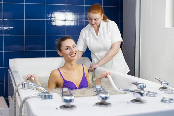Young woman during hydromassage — Stock Photo, Image