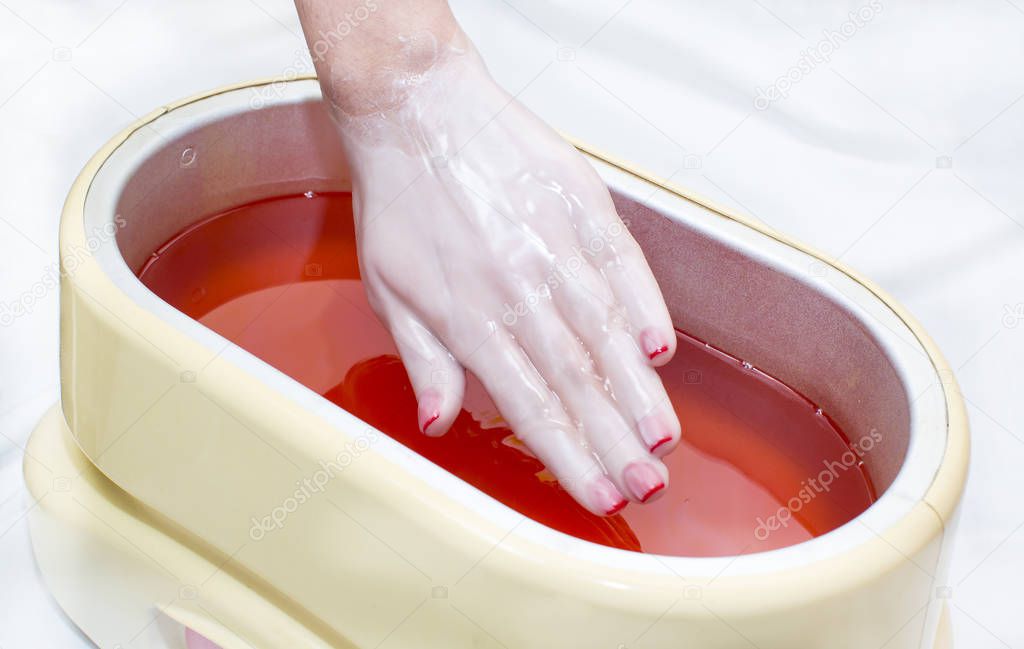 Process paraffin treatment of female hands