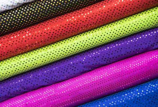 Sfondo dei rotoli tessuto colorato — Foto Stock