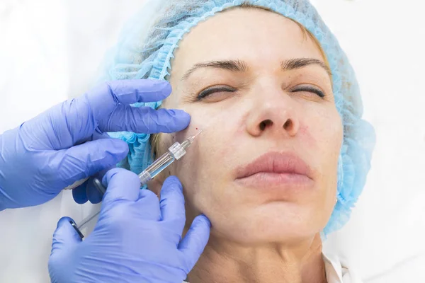 Cosmetic treatment with injection — Stock Photo, Image