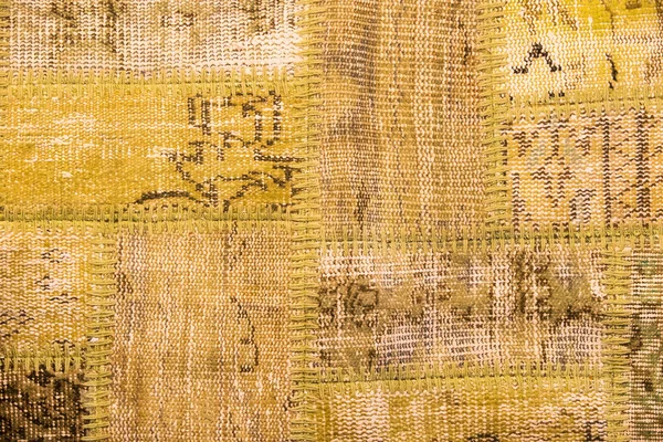Textura de um pedaço de tapete velho — Fotografia de Stock
