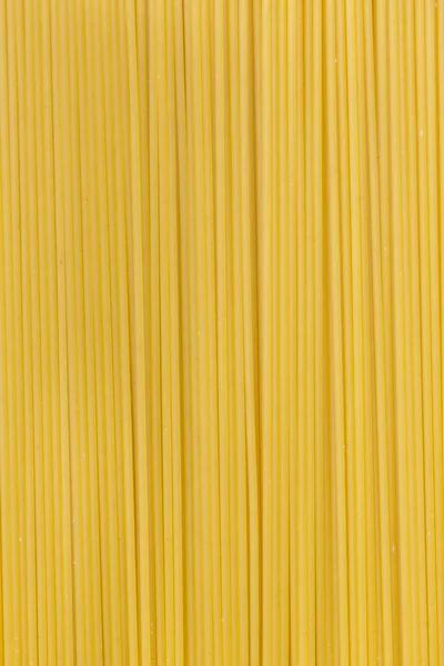 Struttura di fondo degli spaghetti di pasta cruda — Foto Stock