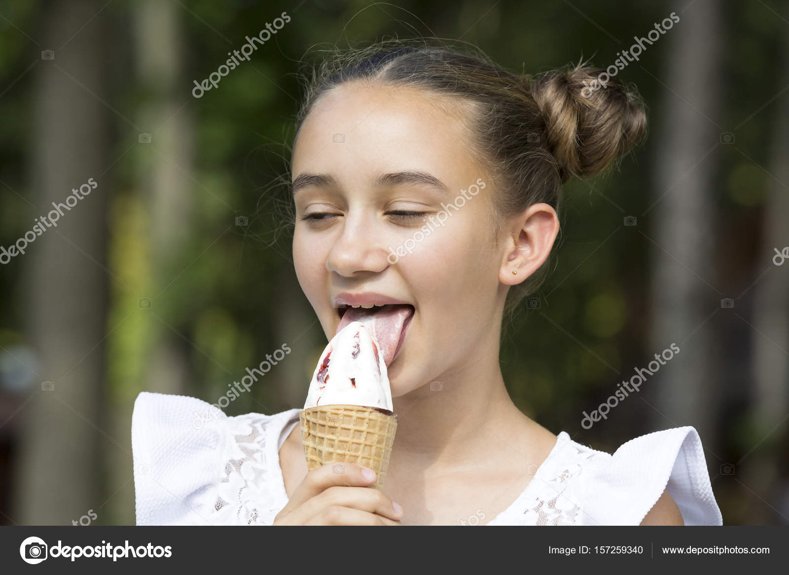 Girl eating ice cream stock photo lester120 157259340