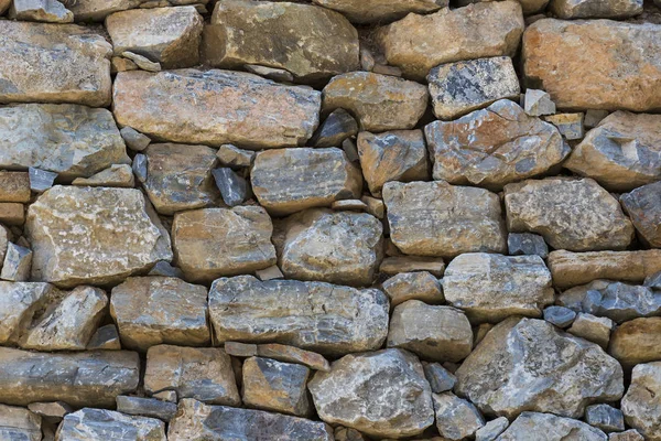 Hintergrund einer alten Steinmauer — Stockfoto