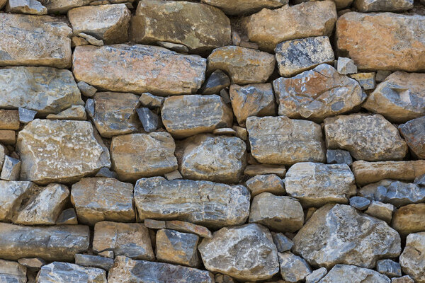 Background of an old stone brick wall