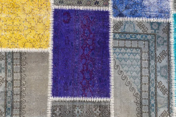 Texture di un pezzo di tappeto vecchio — Foto Stock