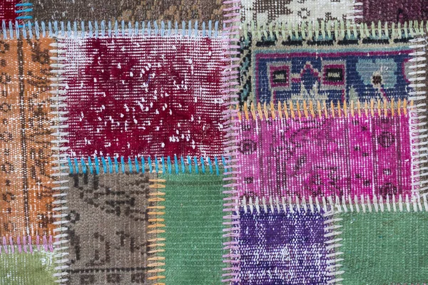 Textura de um pedaço de tapete velho — Fotografia de Stock