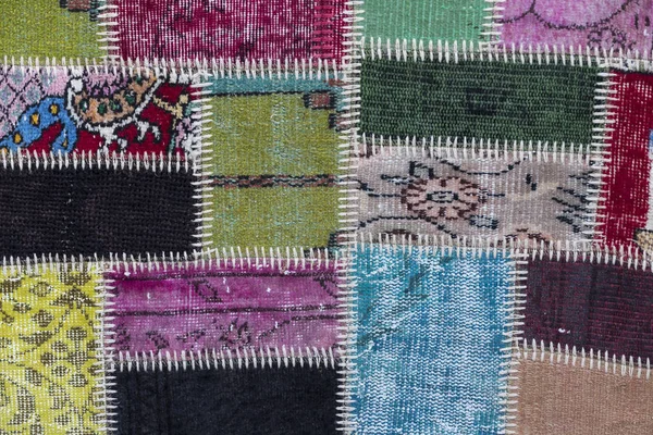 Textura de un trozo de alfombra vieja —  Fotos de Stock