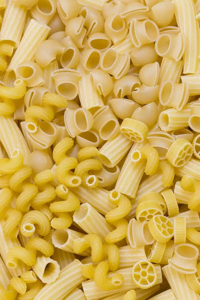 Raw pasta background close — Stock Photo, Image