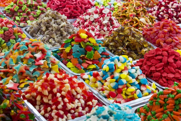 Background of colored jelly sweets shot close-up