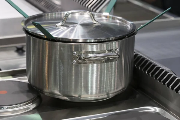 Metal stainless steel pan on a kitchen stove