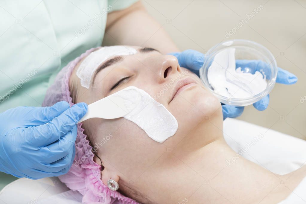 Process cosmetic mask of massage and facials in beauty salon