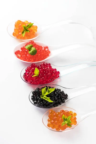 Plastic Spoons Fish Caviar White Background Stock Image