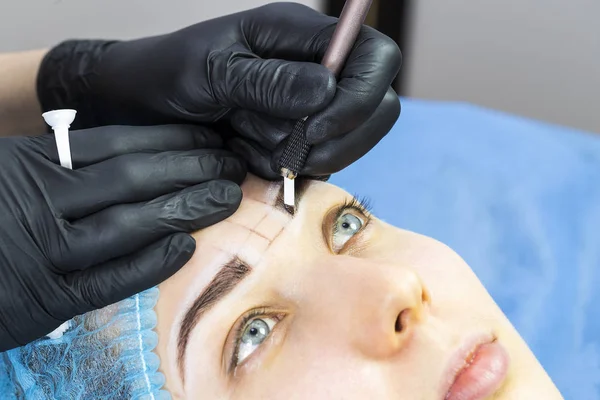 Microblading eyebrows workflow in a beauty salon