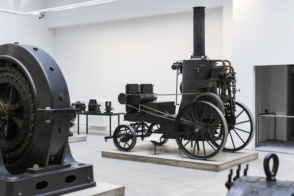 MUNICH, GERMANY - NOVEMBER 26, 2018 : The German Museum of Science and Technology Achievement represents the exposure of old mechanisms for the production of energy steam engines, windmills, electric generators. 