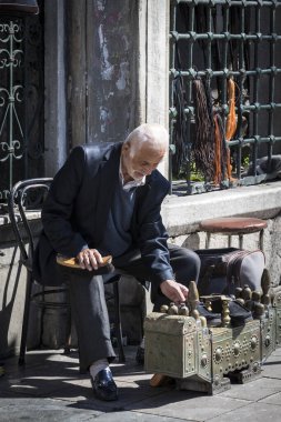 ISTANBUL, TURKEY - 1 APRIL , 2017:Street shoe cleaners in the city of Istanbul in Turkey 