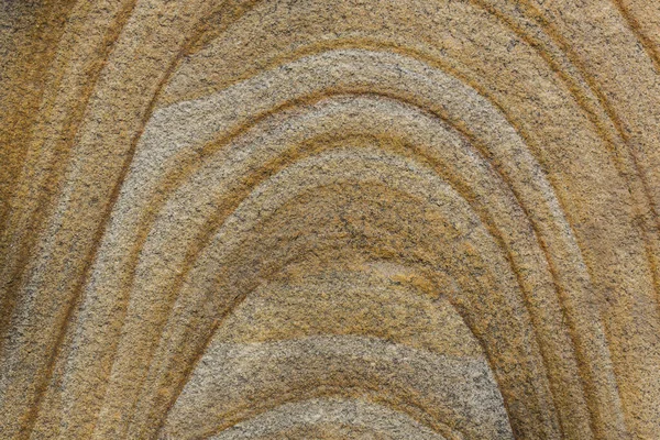 这块石头的质感是普通砂岩的特写 — 图库照片