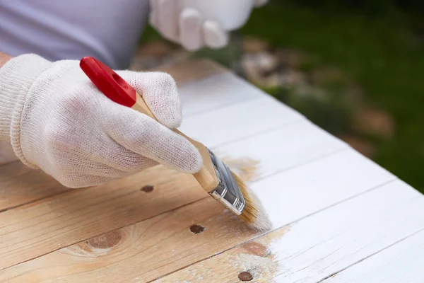 Man hand with paintbrush — Stock Photo, Image