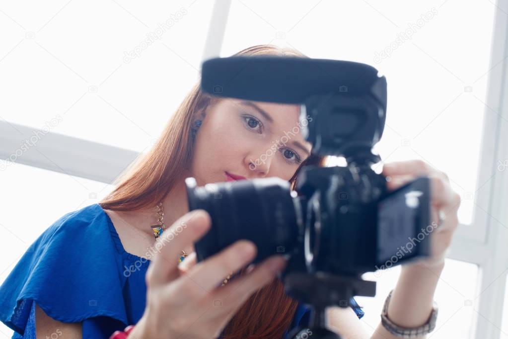 Woman Recording Vlog Video Blog Using DSLR Camera
