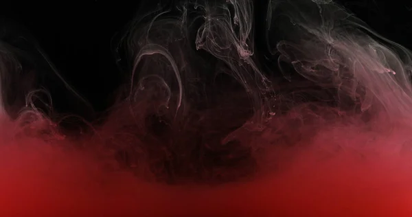 液体の芸術的な形状を作成する水に赤インク塗料 — ストック写真