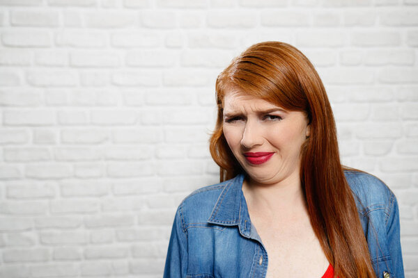 Facial Expressions Of Young Redhead Woman Closeup