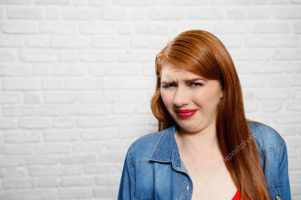 Facial Expressions Of Young Redhead Woman Closeup