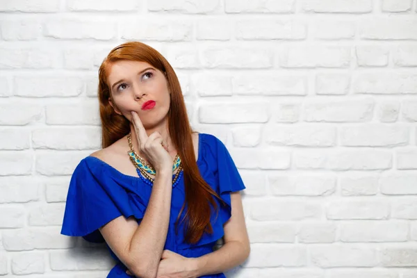 Facial Expressions Of Young Redhead Woman On Brick Wall — Stock Photo, Image