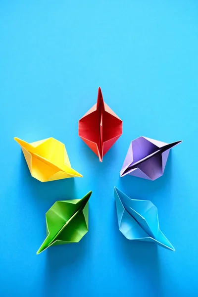 Authentic Origami Boats In Circle On Blue Background — Stock Photo, Image