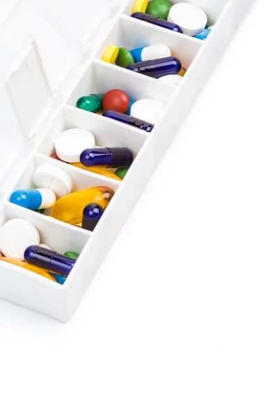 Színes tabletták és kapszulák pill organizer — Stock Fotó