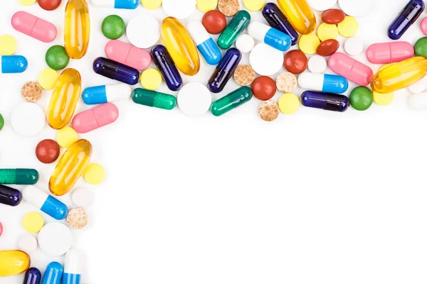Különböző színű tabletta és kapszula — Stock Fotó