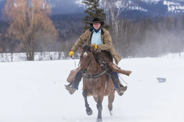 Cowboys Herding Horses In The Snow — Stock Photo, Image