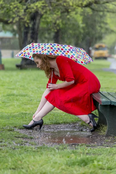 Redhead Model In The Rain