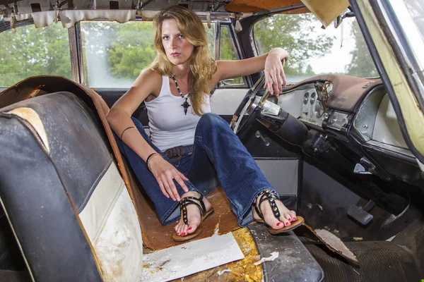 Blonde Model Posing With A Vintage Automobile Stock Picture