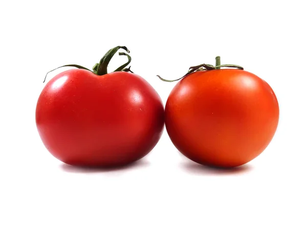 Tomates em um fundo branco. Comida, legumes, tomate vermelho . — Fotografia de Stock