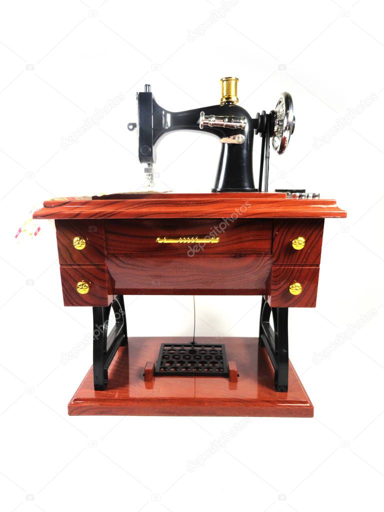 Sewing machine. Souvenir toy. Photo of a toy sewing machine.