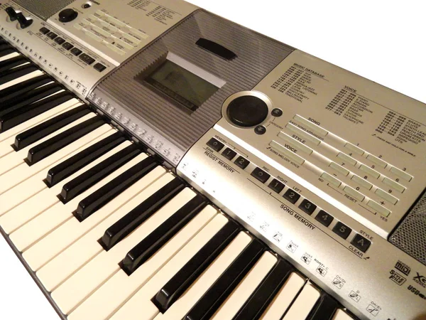 Synthesizer. A musical instrument, a modern analogue of a piano. Keyboard tool. Stock Picture