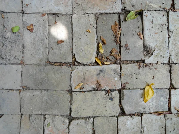 Textura de alvenaria. Cobblestone. Foto de pedra de pavimentação. Pedras naturais usadas na arquitetura . — Fotografia de Stock