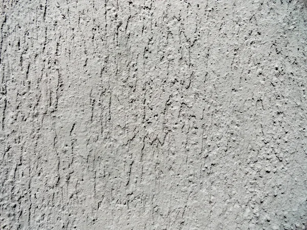 Textura de una vieja pared. Foto de un viejo muro. El muro que ha cambiado con el tiempo . — Foto de Stock