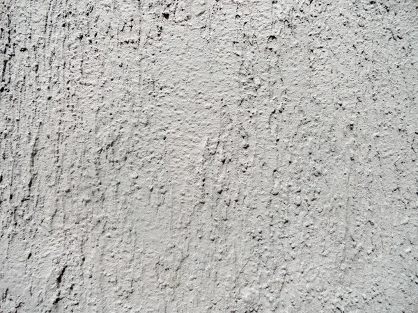 Textura de una vieja pared. Foto de un viejo muro. El muro que ha cambiado con el tiempo . — Foto de Stock