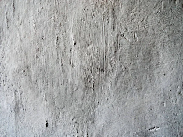 Textura de uma parede velha. Foto de uma parede velha. A parede que mudou ao longo do tempo . — Fotografia de Stock