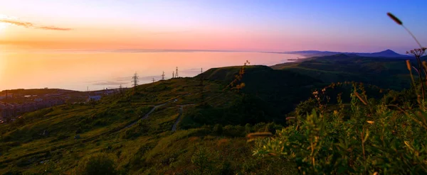 The South-Western coast of Sakhalin island. Sunset at sea. — Stock Photo, Image