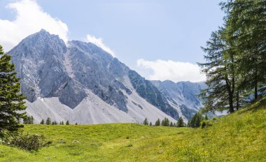 View from Austria to mountain range Karawanks with mountain Stol clipart